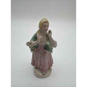 vintage hand-painted porcelain colonial or Victorian lady figurine